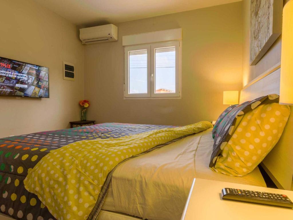 Postel nebo postele na pokoji v ubytování Golden Villas