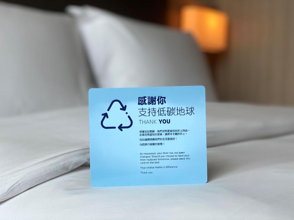 Postel nebo postele na pokoji v ubytování Holiday Inn Express Hong Kong Kowloon CBD2 by IHG