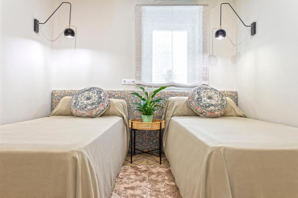 Posteľ alebo postele v izbe v ubytovaní Genteel Home Recogidas