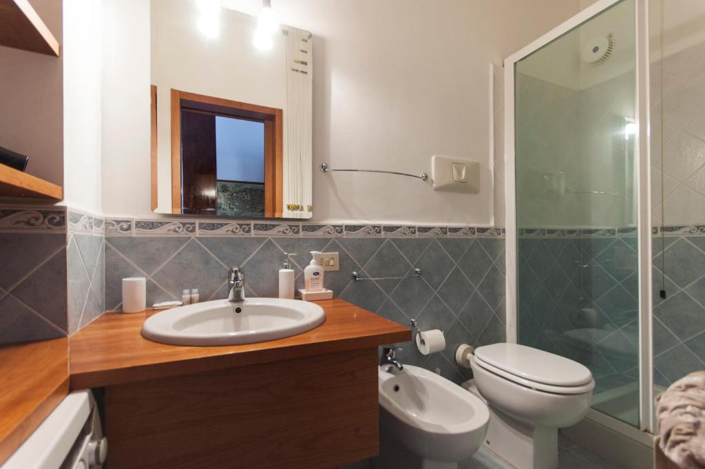 Kúpeľňa v ubytovaní De Angeli Cozy Apartment- Youhosty