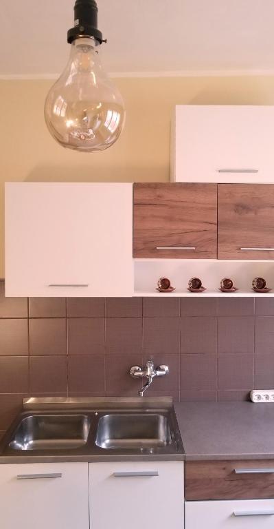 Kuchyň nebo kuchyňský kout v ubytování Apartment PER DAY