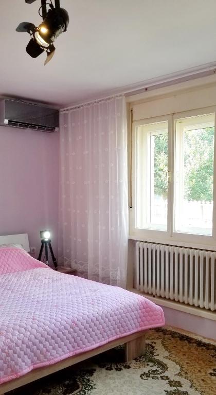 Postel nebo postele na pokoji v ubytování Apartment PER DAY