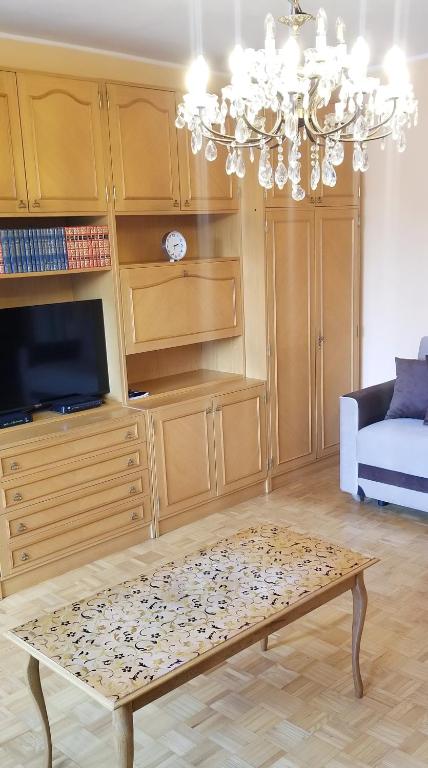 TV a/nebo společenská místnost v ubytování Apartment PER DAY