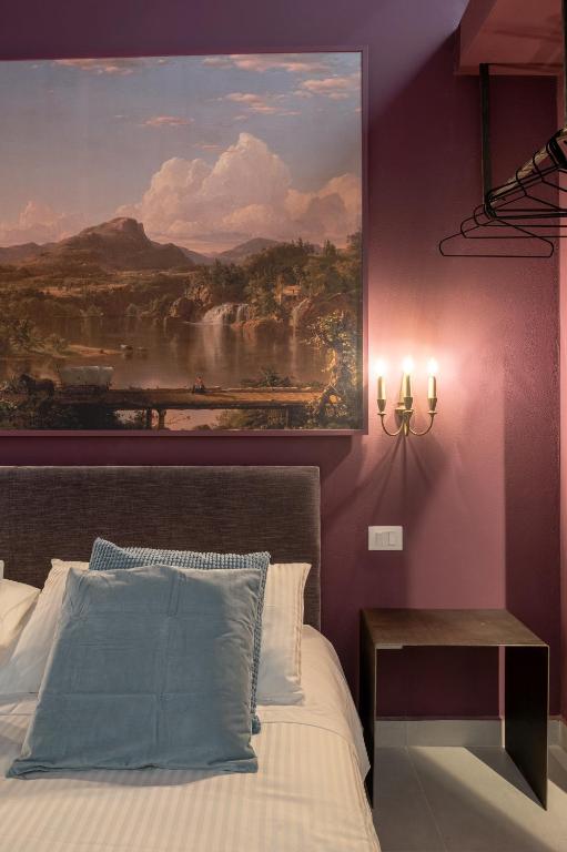 Łóżko lub łóżka w pokoju w obiekcie ORTIGIAdreamrooms 14