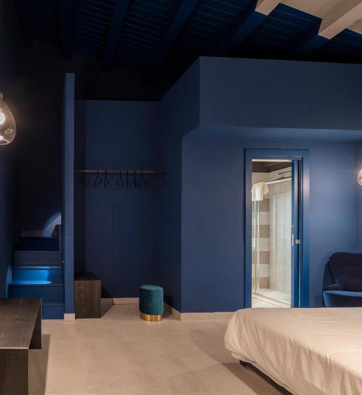 Łóżko lub łóżka w pokoju w obiekcie ORTIGIAdreamrooms 14