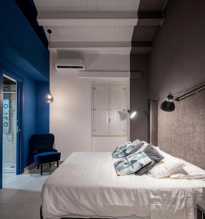 Łóżko lub łóżka w pokoju w obiekcie ORTIGIAdreamrooms 14