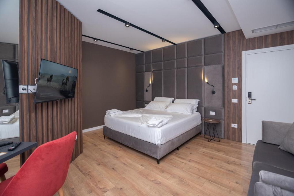 Postel nebo postele na pokoji v ubytování Hotel PortSide GF
