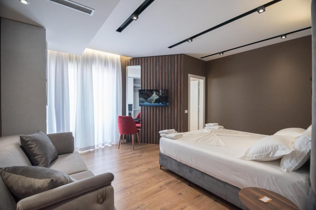 Postel nebo postele na pokoji v ubytování Hotel PortSide GF