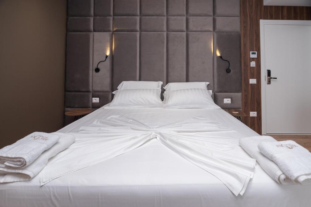 Postel nebo postele na pokoji v ubytování Hotel PortSide GF