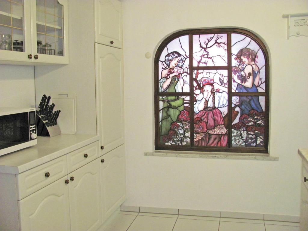 Kuchyň nebo kuchyňský kout v ubytování Apartment Storchenfärbe