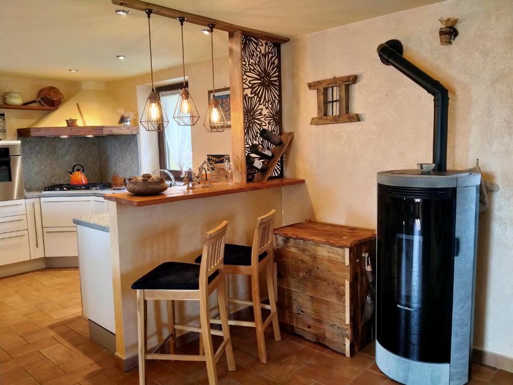 Kuchyň nebo kuchyňský kout v ubytování L'Atelier du Temps - Tzi Voycas