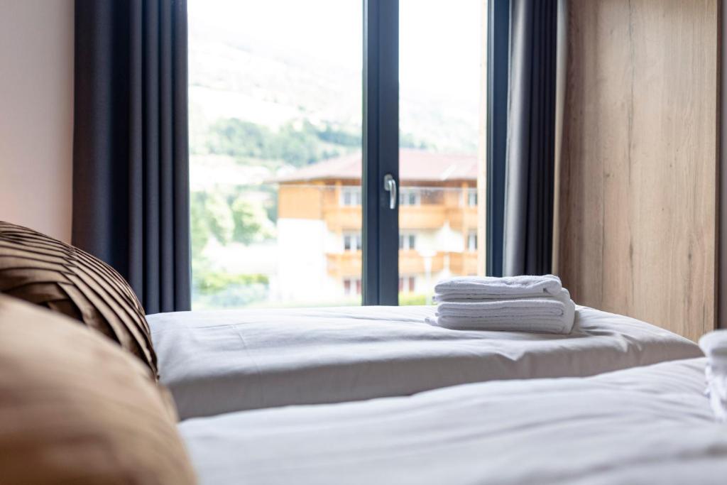 Posteľ alebo postele v izbe v ubytovaní Kreischberg Suites by ALPS RESORTS