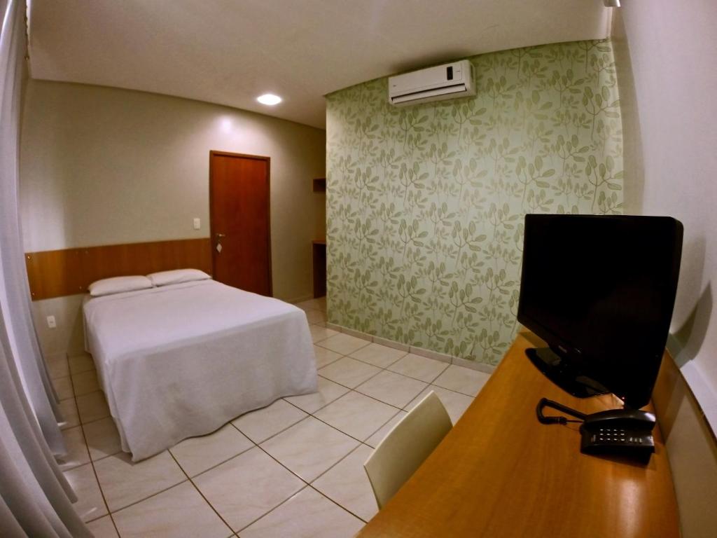 Postel nebo postele na pokoji v ubytování Hotel Talissa 2