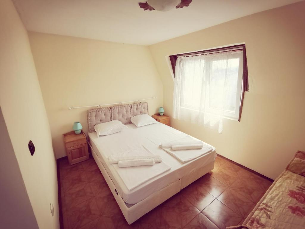 Postel nebo postele na pokoji v ubytování Hotel VALDI