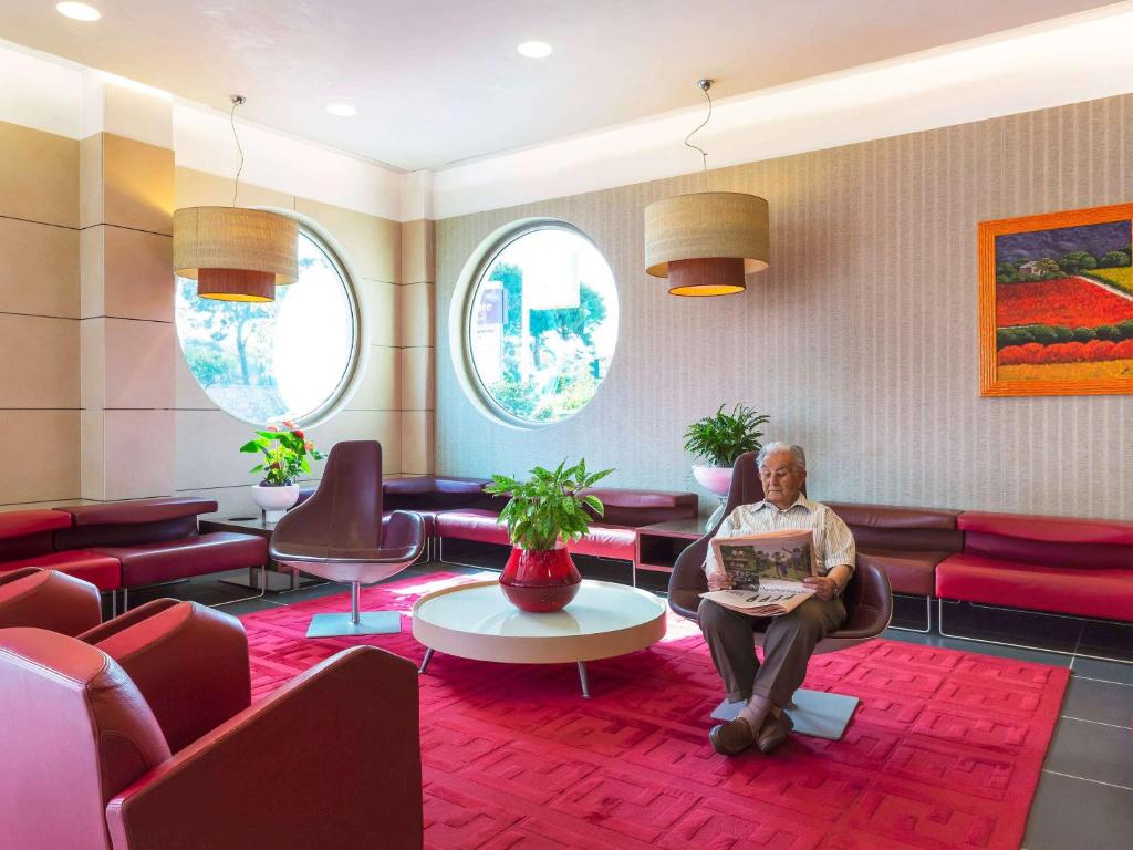 Posezení v ubytování Hotel Mercure Siracusa