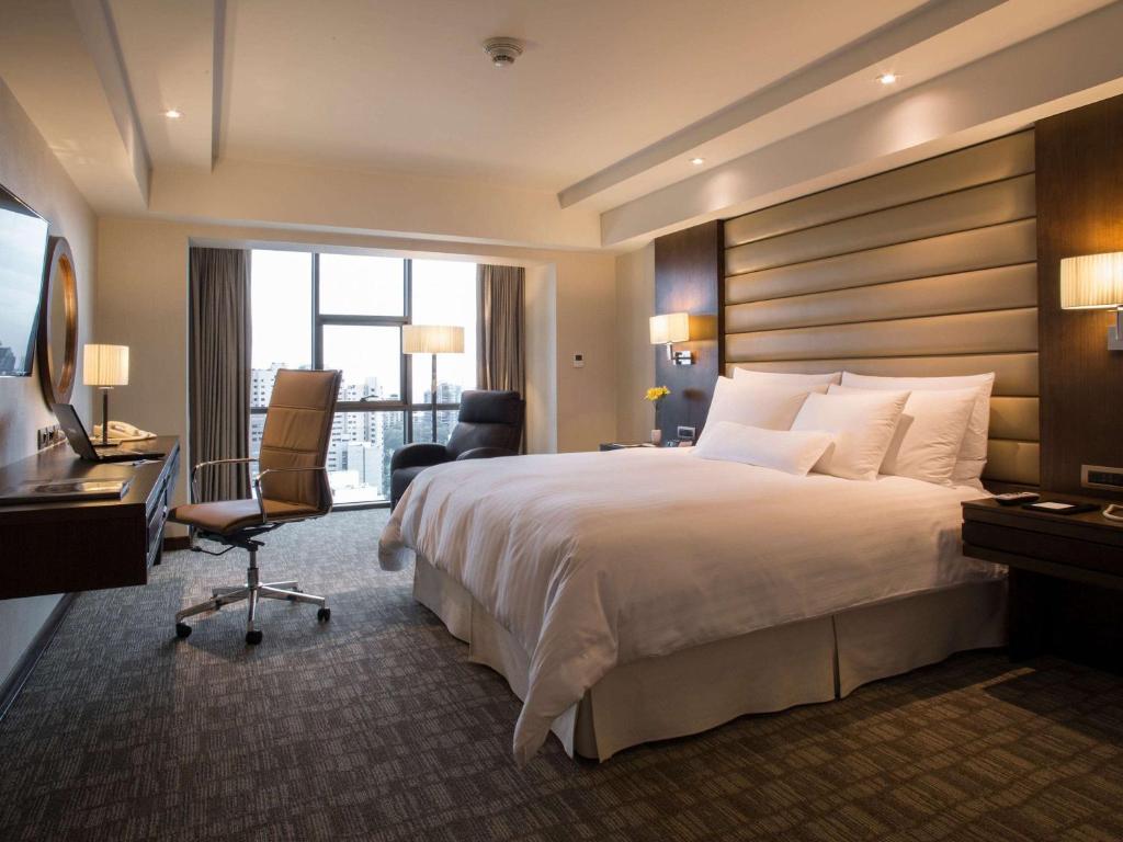 Letto o letti in una camera di Swissotel Lima