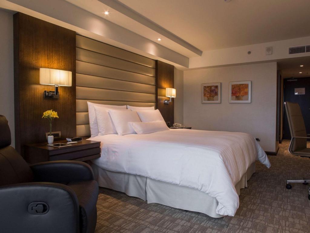 Letto o letti in una camera di Swissotel Lima