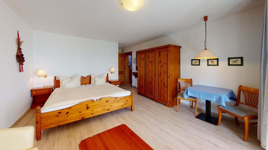 Postel nebo postele na pokoji v ubytování Hotel Seepark Appartements