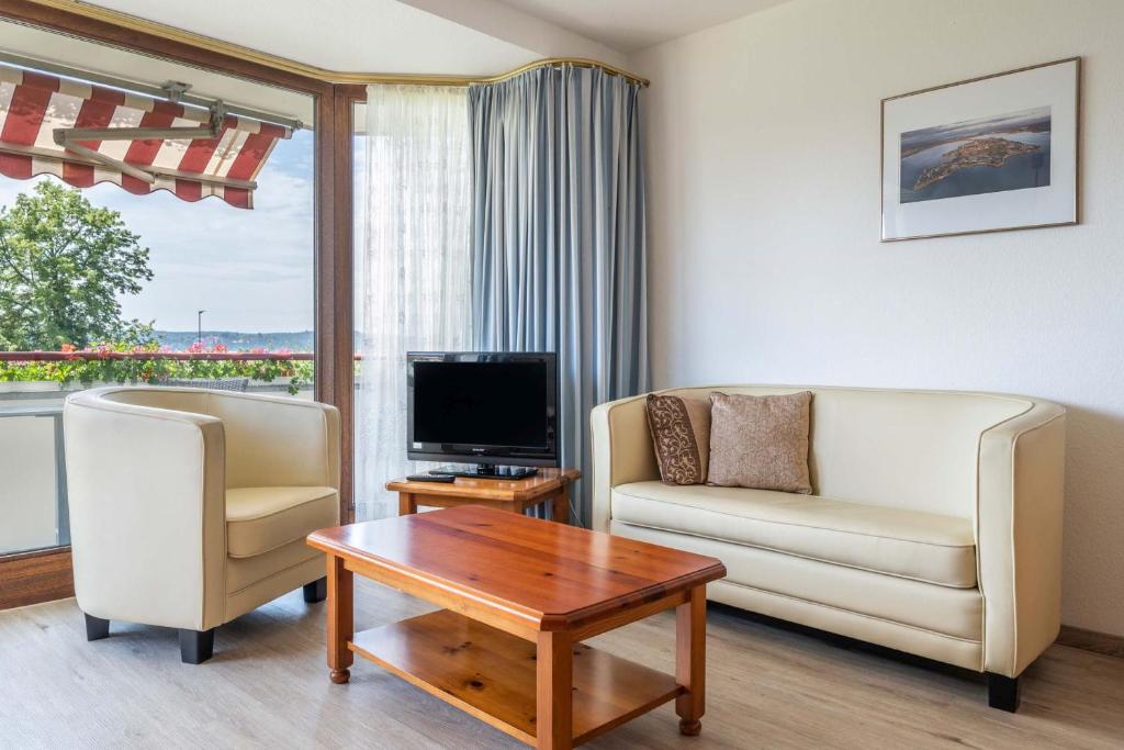 TV a/nebo společenská místnost v ubytování Hotel Seepark Appartements