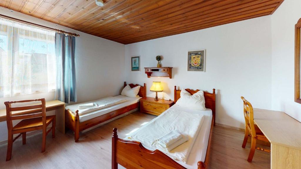 Postel nebo postele na pokoji v ubytování Hotel Seepark Appartements