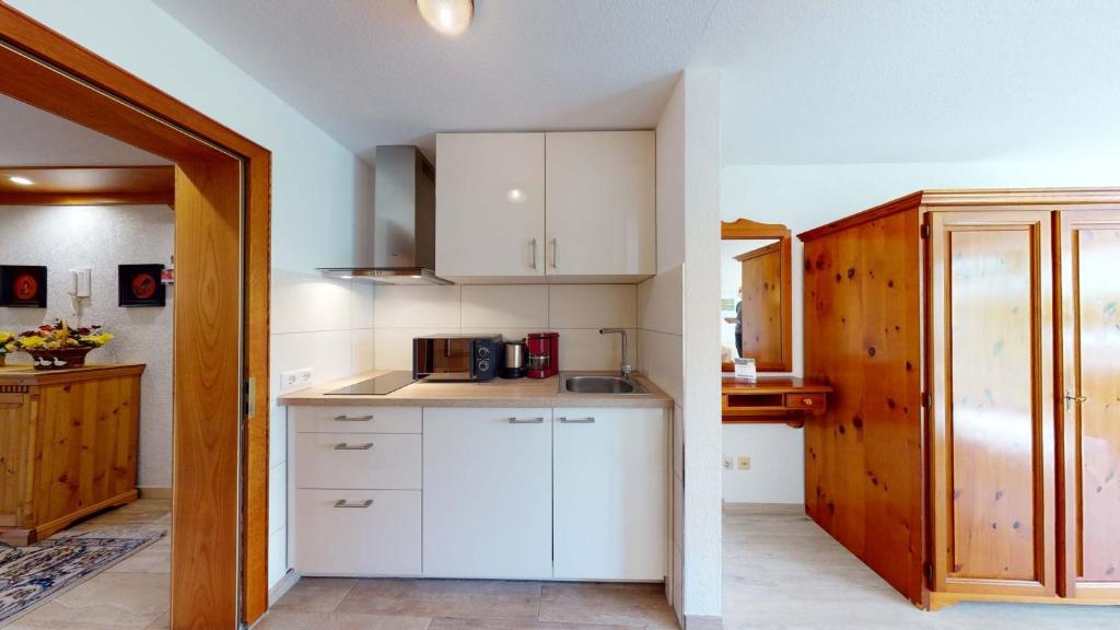 Kuchyň nebo kuchyňský kout v ubytování Hotel Seepark Appartements
