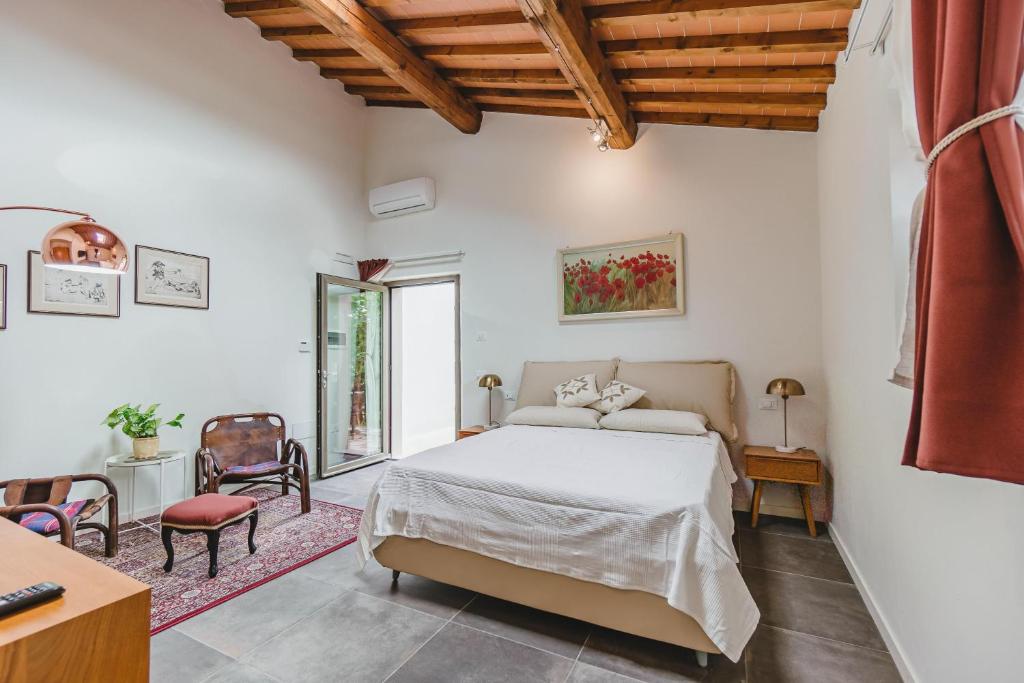 Postel nebo postele na pokoji v ubytování Agriturismo Le Fonti