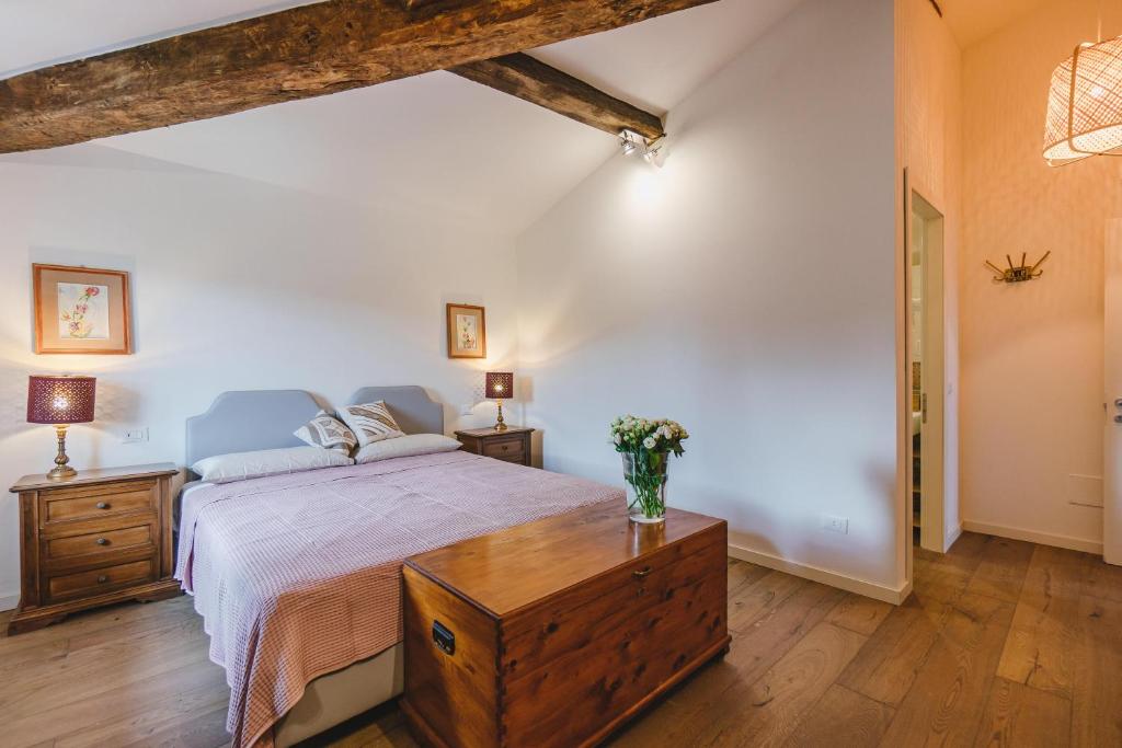 Postel nebo postele na pokoji v ubytování Agriturismo Le Fonti