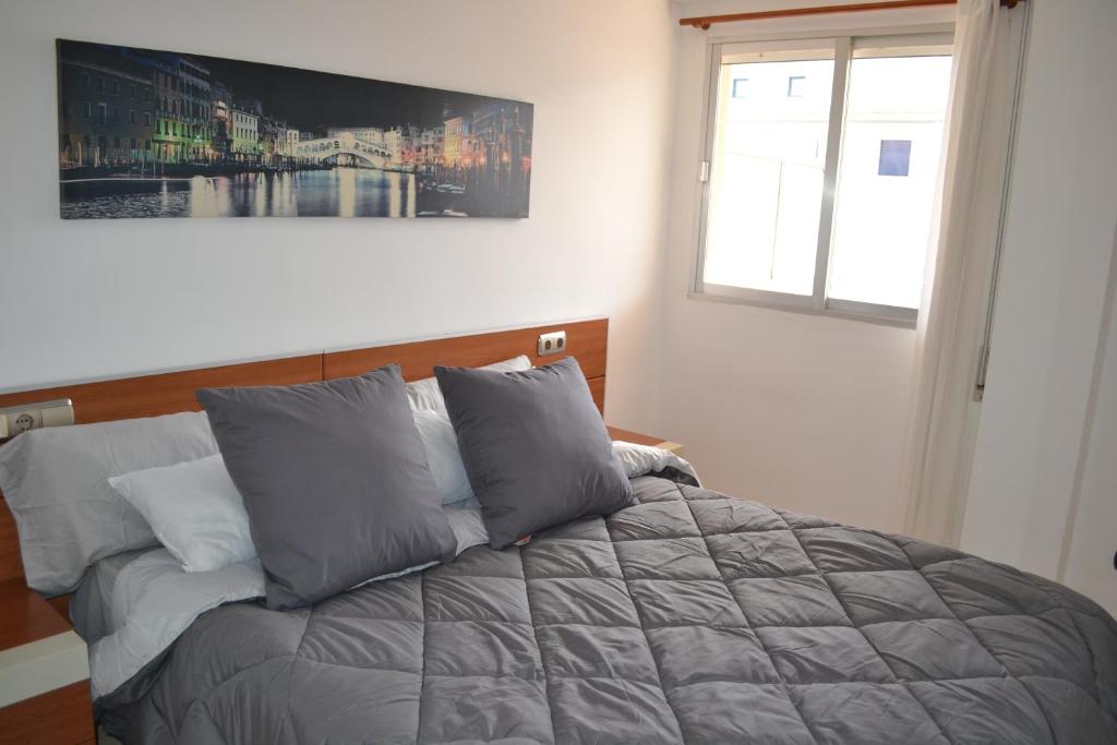 Postel nebo postele na pokoji v ubytování Apartamento Cid