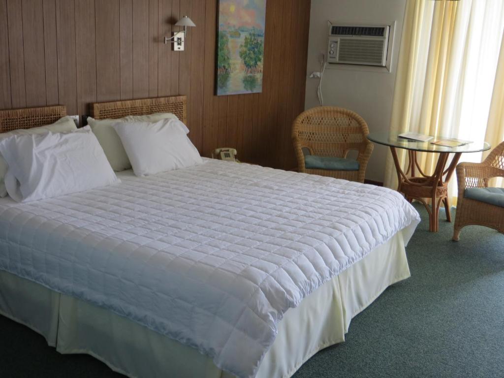 Postel nebo postele na pokoji v ubytování Sugarloaf Lodge