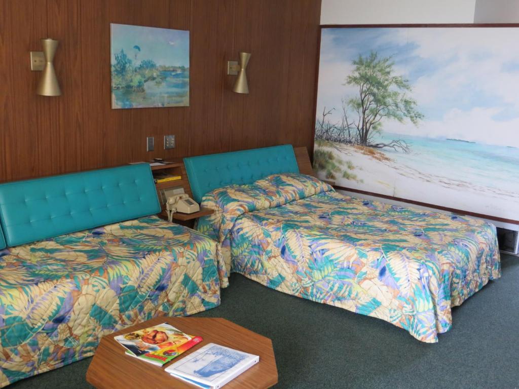 Postel nebo postele na pokoji v ubytování Sugarloaf Lodge