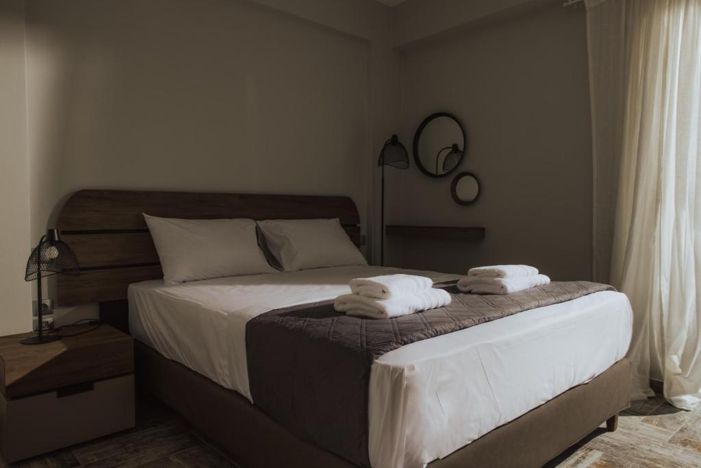 Postel nebo postele na pokoji v ubytování YaMa Villas