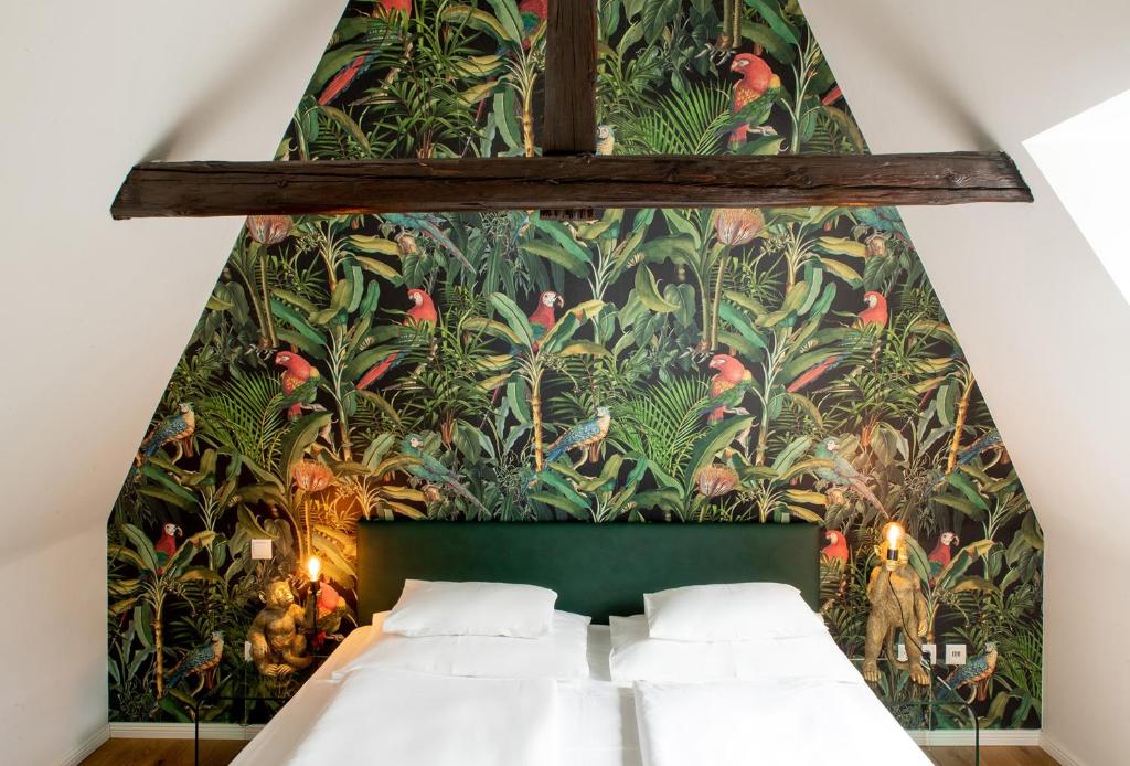 Postel nebo postele na pokoji v ubytování Boutique Hotel Dom - Rooms & Suites