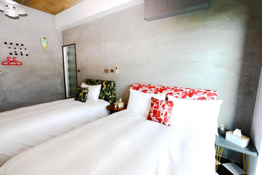 Postel nebo postele na pokoji v ubytování Noah's Ark Homestay
