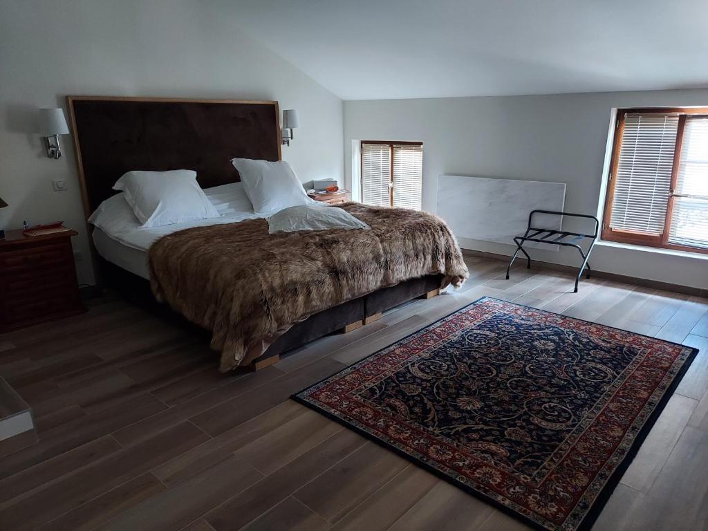 Postel nebo postele na pokoji v ubytování Hôtel du Domaine de La Grange de Condé