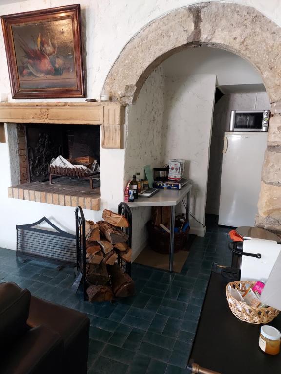 Kuchyň nebo kuchyňský kout v ubytování Hôtel du Domaine de La Grange de Condé