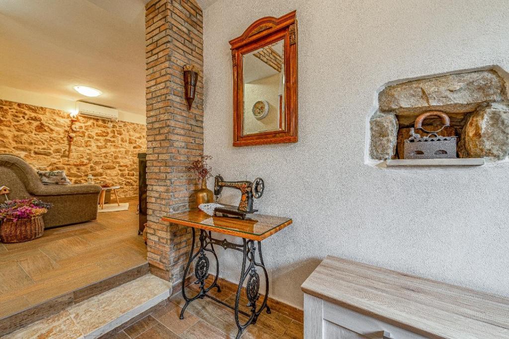 Posedenie v ubytovaní Holiday Home Stone Wall