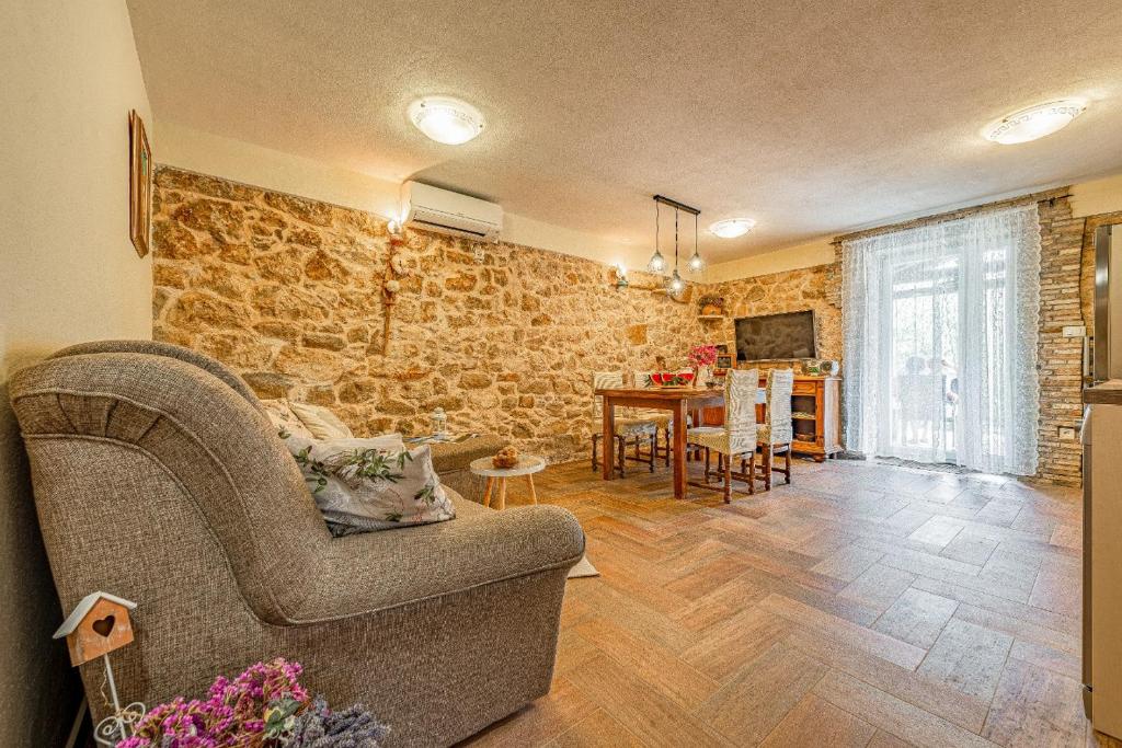 Posedenie v ubytovaní Holiday Home Stone Wall