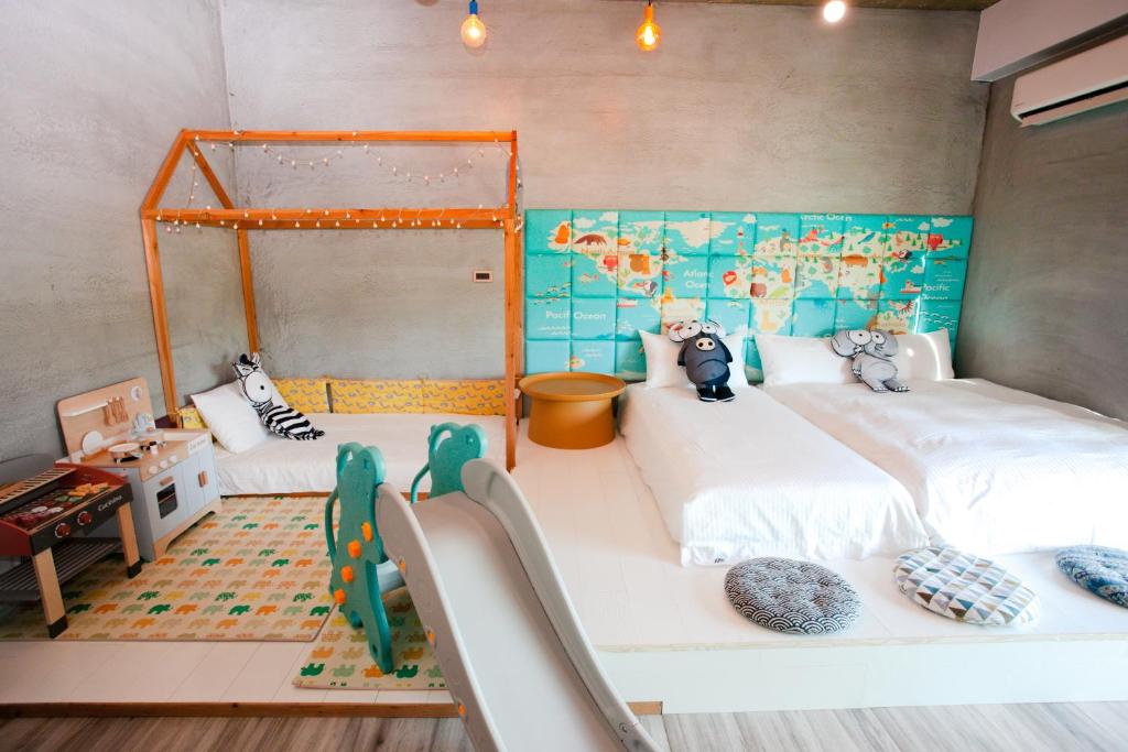 Postel nebo postele na pokoji v ubytování Noah's Ark Homestay