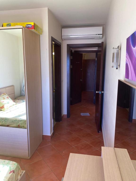 Postel nebo postele na pokoji v ubytování Golf porto marina