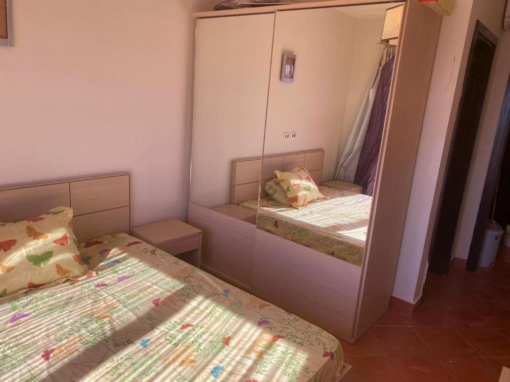 Postel nebo postele na pokoji v ubytování Golf porto marina