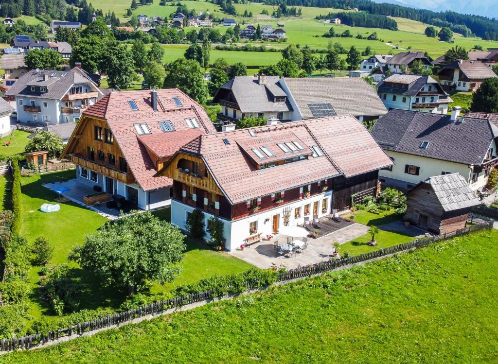 an aerial view of a large house in a village at Haus Schitter in Mauterndorf