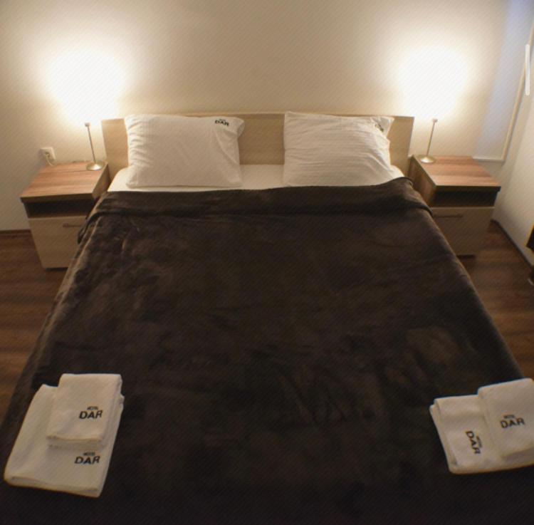 Postel nebo postele na pokoji v ubytování Motel & Restaurant Dar