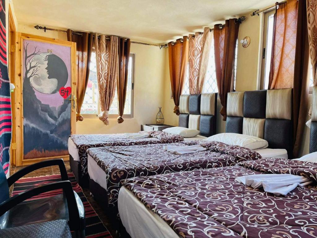 Postel nebo postele na pokoji v ubytování Dana Gate Lodge