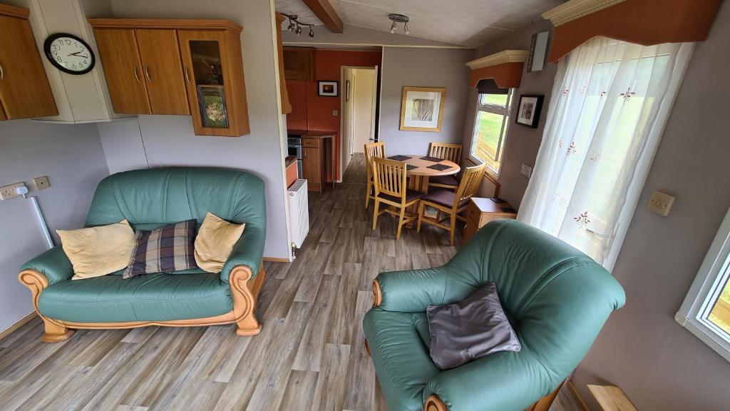 Posezení v ubytování Hawthorn Self Catering Cottages