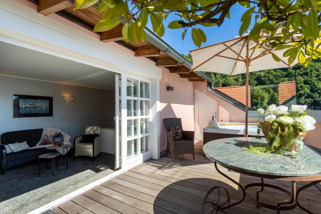 TV a/nebo společenská místnost v ubytování Hotel Residenz Passau