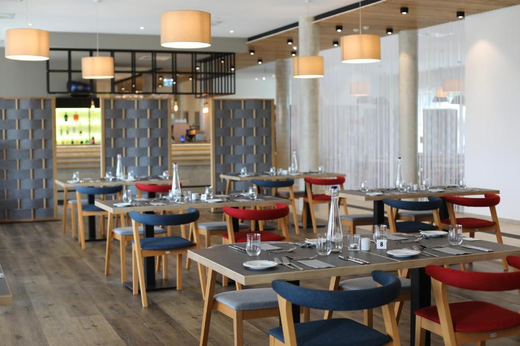 Restaurace v ubytování Hotel INCLUDiO