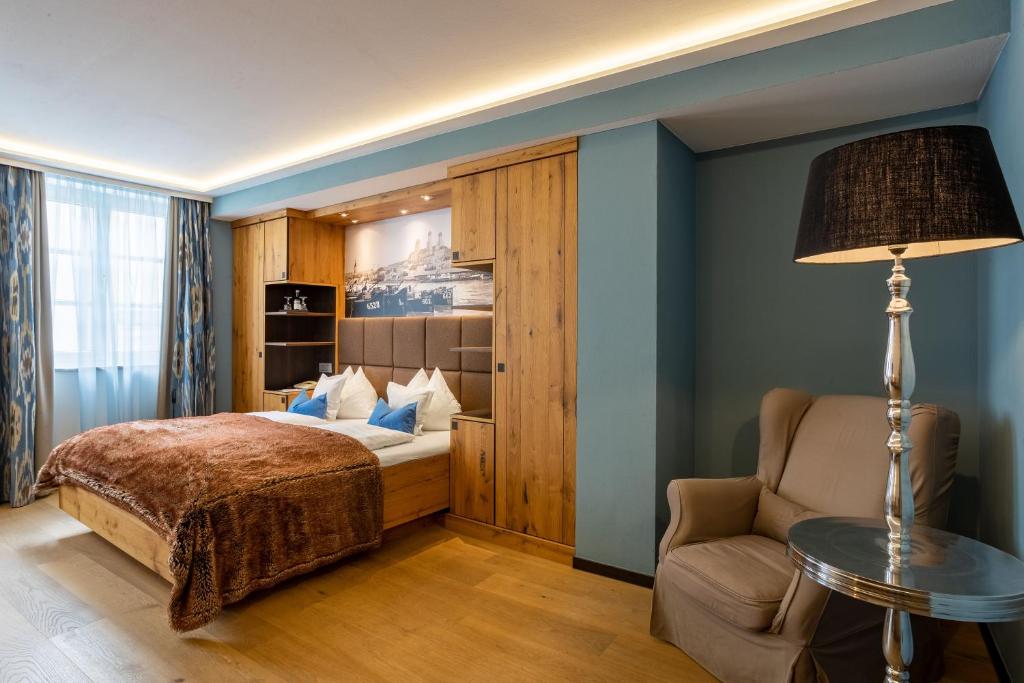 Postel nebo postele na pokoji v ubytování Hotel Residenz Passau