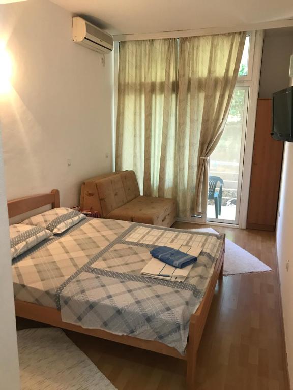 Postel nebo postele na pokoji v ubytování Tina Rooms