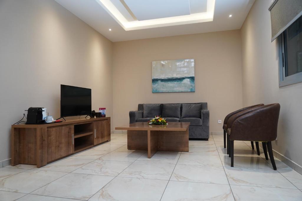 TV a/nebo společenská místnost v ubytování HOTEL ASTRAL