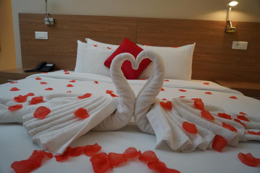 Postel nebo postele na pokoji v ubytování HOTEL ASTRAL